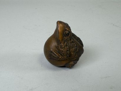 JAPON, XXe.
Netsuké en bois sculpté figurant...