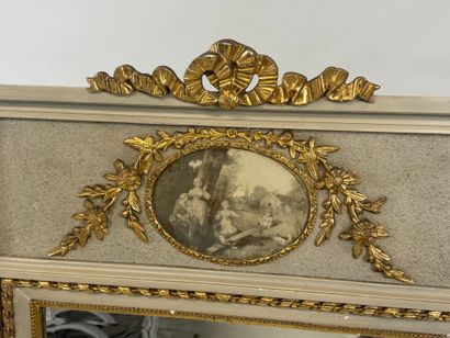 Lacquered and molded wood trumeau decorated...