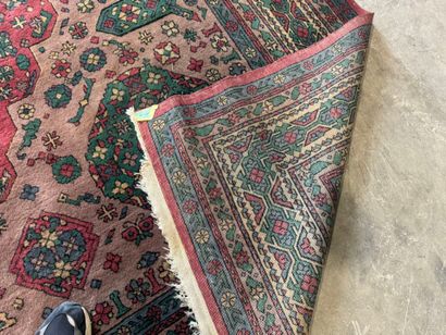 *
Large wool carpet with geometric and stylized...