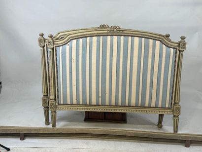 Lacquered, molded and carved wooden bed decorated...