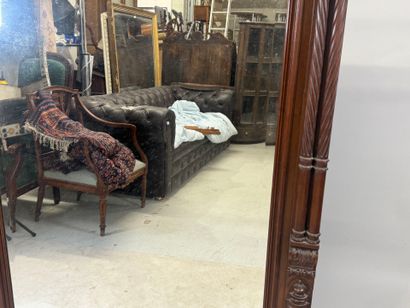 Large molded and carved wood mirror with...