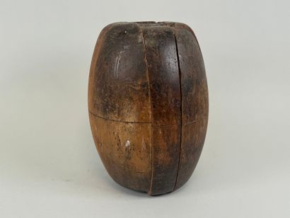 Large wooden puzzle in the shape of a rugby...