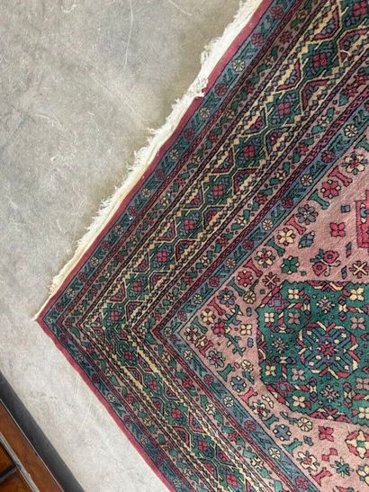 *
Large wool carpet with geometric and stylized...