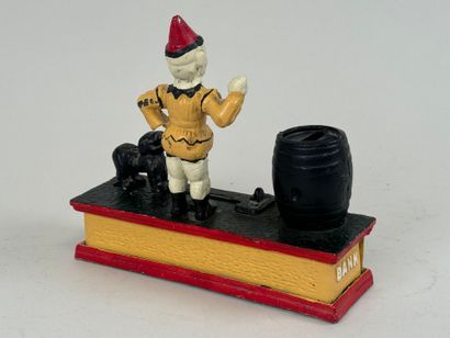 TRICK DOG.
Polychrome cast-iron money box...