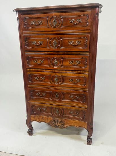 Cherry wood chiffonier opening with six drawers.
Louis...