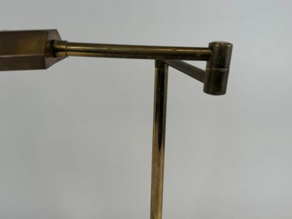 Brass desk lamp, swivel arm, circular base.
H....