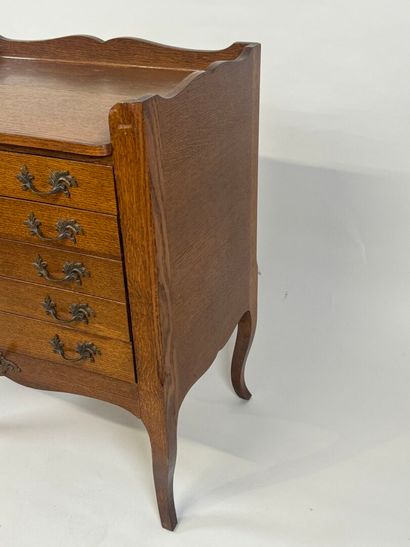 ERCUIS.
Moulded oak silver cabinet opening...