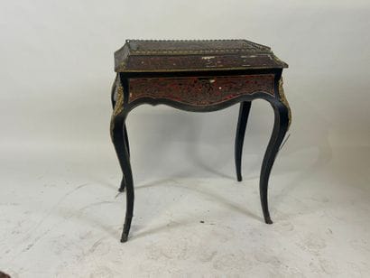 Planter in blackened wood and brass fillet...
