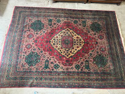 *
Large wool carpet with geometric and stylized...