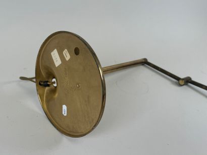 Brass desk lamp, swivel arm, circular base.
H....