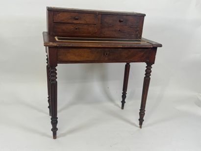 Stained wood stepped desk opening with a...