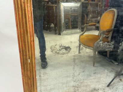 Large rectangular mirror in wood and gilded...