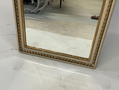 Lacquered and molded wood trumeau decorated...