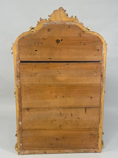 Large gilded and carved wood mirror with...