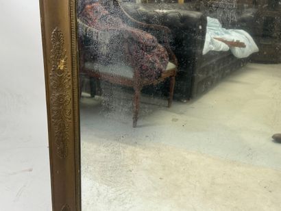 Rectangular wood and gilded stucco mirror...