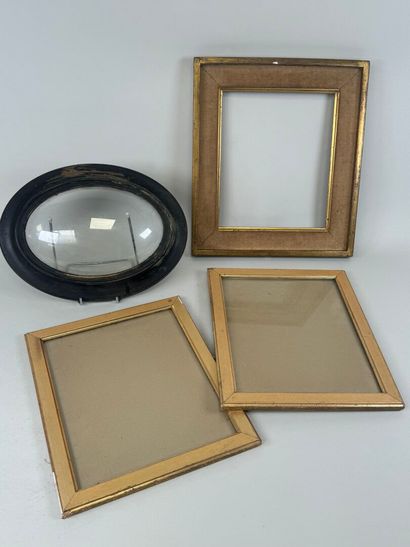 Set of four giltwood and blackened wood frames,...