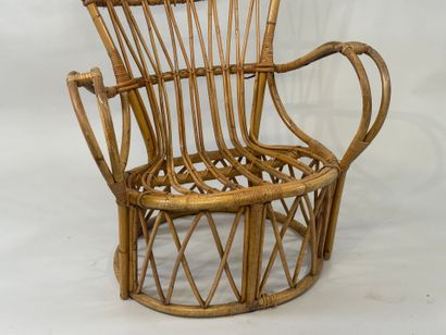 Openwork wicker armchair.
93 x 70 x 60 c...