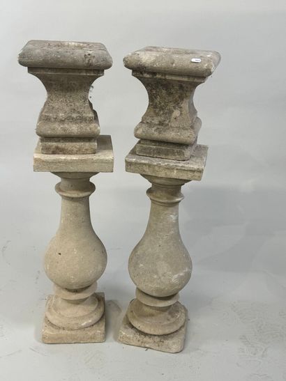 Pair of stone baluster columns, square base.
61...
