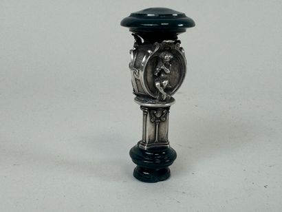 Metal and hardstone cachet with faceted decoration...