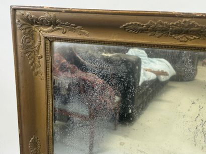 Rectangular wood and gilded stucco mirror...