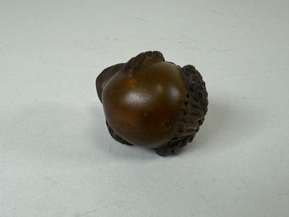 JAPON, XXe.
Netsuké en bois sculpté figurant...