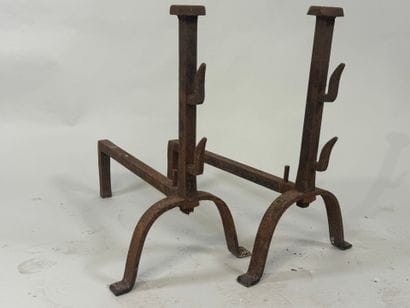 Pair of cast iron landiers.
19th century.
63...