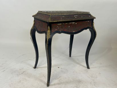 Planter in blackened wood and brass fillet...