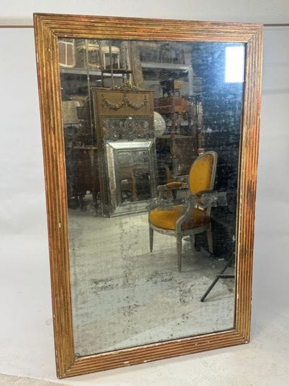 Large rectangular mirror in wood and gilded...