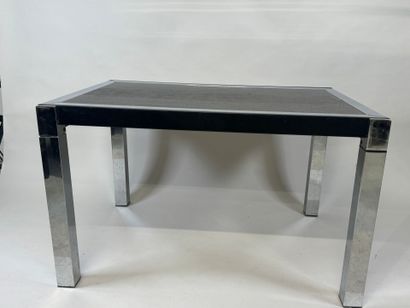 Extendable table in stained wood and chrome.
70s.
73...