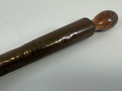 Triboulet en bois tourné et laiton.
L. 21,5...