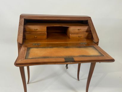 Cherrywood sloping desk opening with a flap...