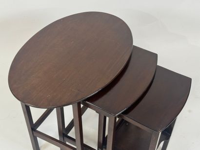 Moulded mahogany nesting tables, one brace...