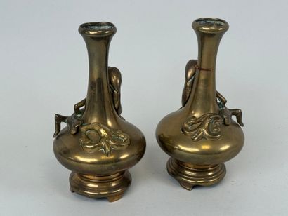 ASIA, 20th century.
Pair of bronze vases...