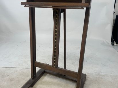 Large molded wood easel, the lower part adjustable...