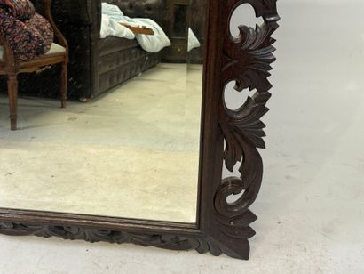 Moulded, carved and openworked wooden mirror...