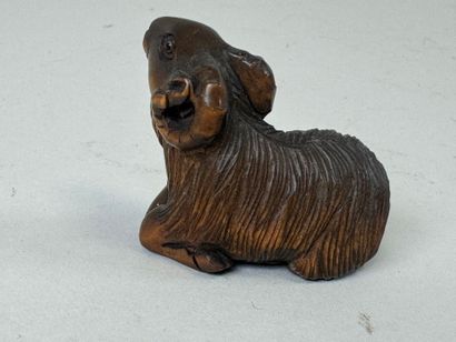 JAPON, XXe.
Netsuké en bois sculpté figurant...