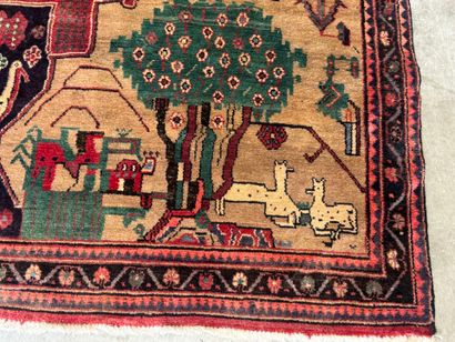Hand-knotted wool rug decorated with landscapes...