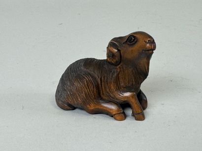 JAPON, XXe.
Netsuké en bois sculpté figurant...