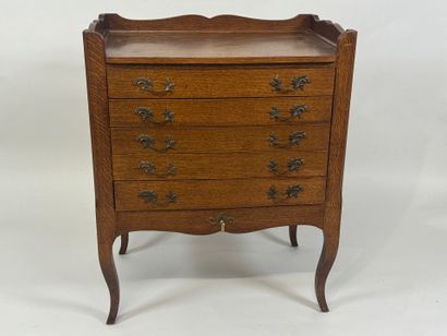 ERCUIS.
Moulded oak silver cabinet opening...
