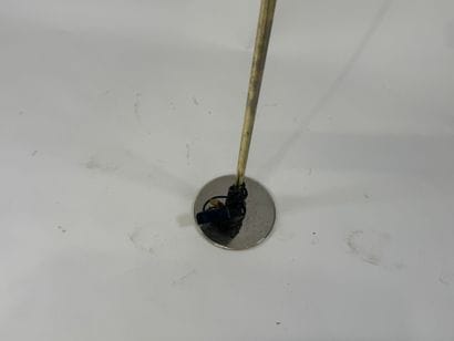 Large brass floor lamp.
H. 187 cm.
(wear,...