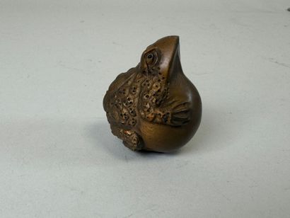 JAPON, XXe.
Netsuké en bois sculpté figurant...