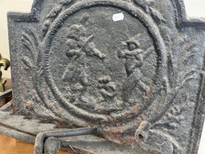 Lot including :
- cast-iron fireback decorated...