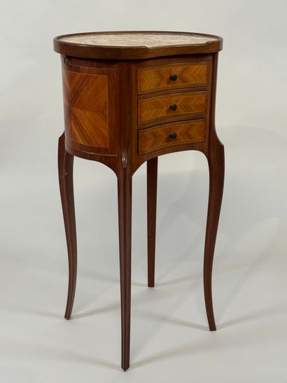 Small kidney-shaped bedside table in wood...