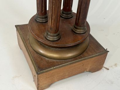 Moulded wood and brass sellette with four...