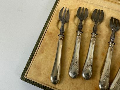Six silver-plated oyster forks with foliate...