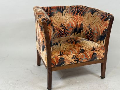 Molded wood armchair with floral velvet upholstery.
70...