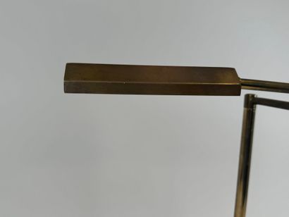 Brass desk lamp, swivel arm, circular base.
H....