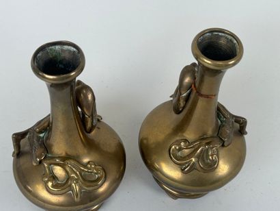 ASIA, 20th century.
Pair of bronze vases...