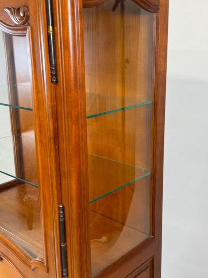 Moulded cherrywood display cabinet opening...