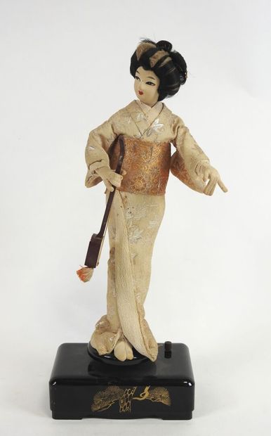 Automaton and musical doll featuring a Japanese...